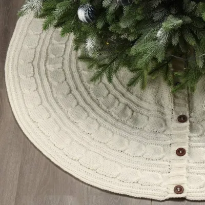 クリスマススカート｜23本編み・毛糸・クリスマスデコレーション・ホワイト・ボタンのデザイン